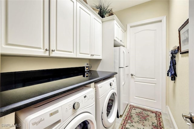 4536 SW 12th Pl, Cape Coral, FL 33914 - washroom with separate washer and dryer, baseboards, and cabinet space