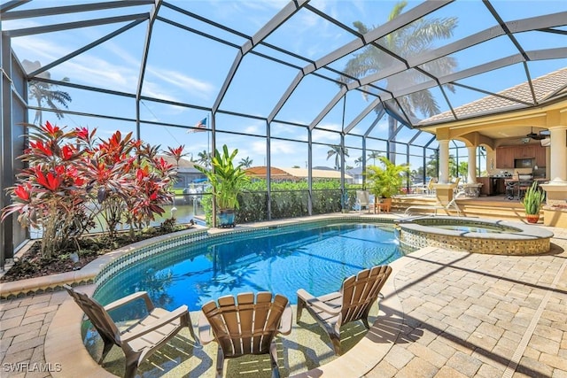 4536 SW 12th Pl, Cape Coral, FL 33914 - view of pool with a lanai, a patio area, a pool with connected hot tub, and a ceiling fan