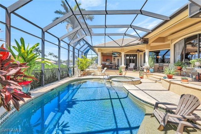 4536 SW 12th Pl, Cape Coral, FL 33914 - view of swimming pool with a lanai, a patio, ceiling fan, and a pool with connected hot tub