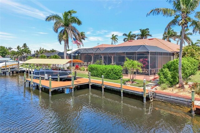 4536 SW 12th Pl, Cape Coral, FL 33914 - view of dock with a water view, glass enclosure, and boat lift