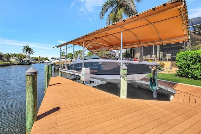 4536 SW 12th Pl, Cape Coral, FL 33914 - dock area with boat lift and a water view