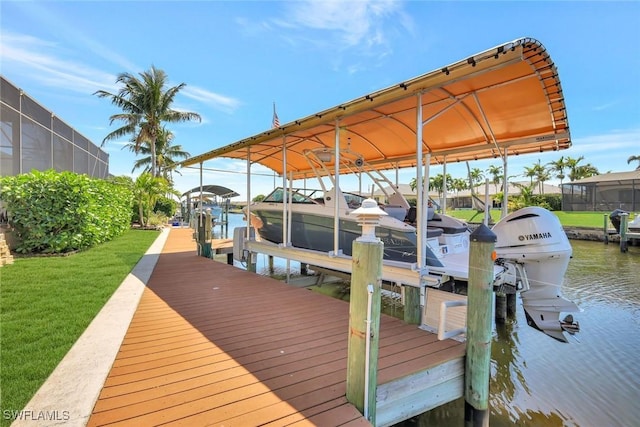 4536 SW 12th Pl, Cape Coral, FL 33914 - view of dock featuring a water view, a yard, and boat lift