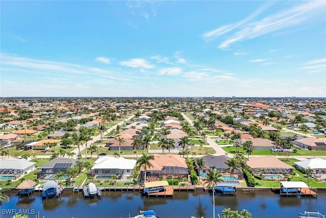 4536 SW 12th Pl, Cape Coral, FL 33914 - drone / aerial view featuring a water view and a residential view