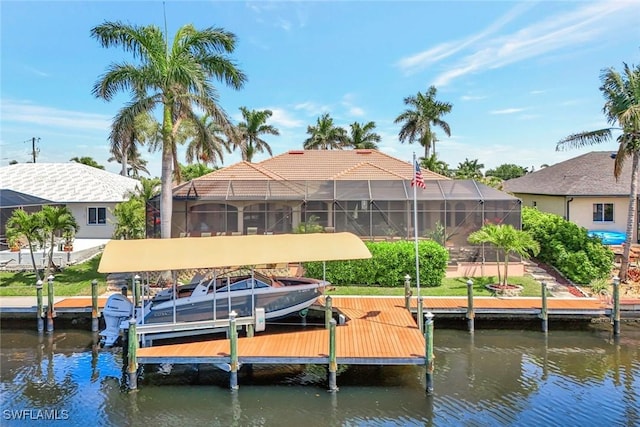 4536 SW 12th Pl, Cape Coral, FL 33914 - dock area featuring a water view, a lanai, and boat lift