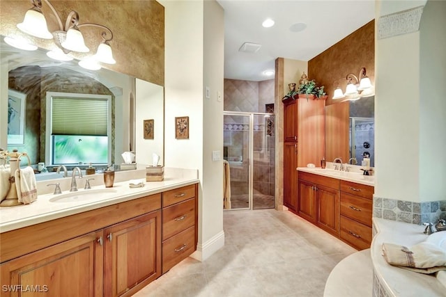 4536 SW 12th Pl, Cape Coral, FL 33914 - bathroom with two vanities, a notable chandelier, tile patterned floors, a shower stall, and a sink
