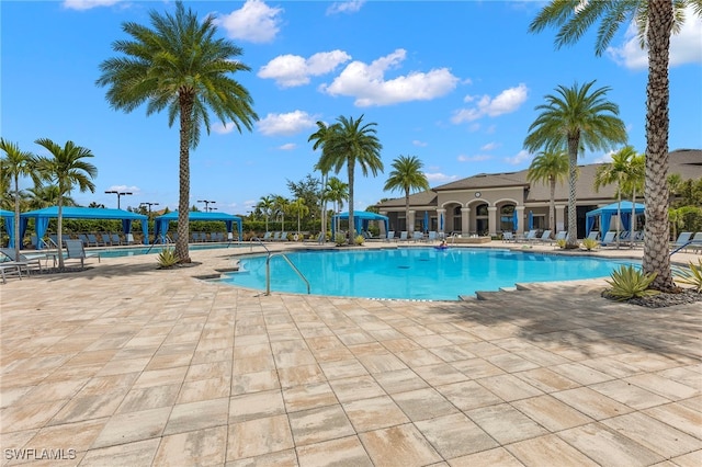 11552 Riverstone Ln, Fort Myers, FL 33913 - community pool featuring a gazebo and a patio area