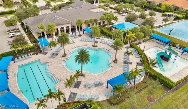 11552 Riverstone Ln, Fort Myers, FL 33913 - community pool with a water slide and a water play area