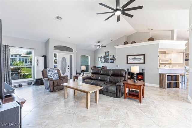 1633 Barbarosa Ct, Marco Island, FL 34145 - living area featuring visible vents, marble finish floor, vaulted ceiling, and ceiling fan