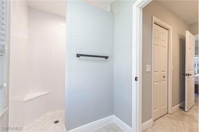 1633 Barbarosa Ct, Marco Island, FL 34145 - ensuite bathroom featuring ensuite bathroom, baseboards, and walk in shower