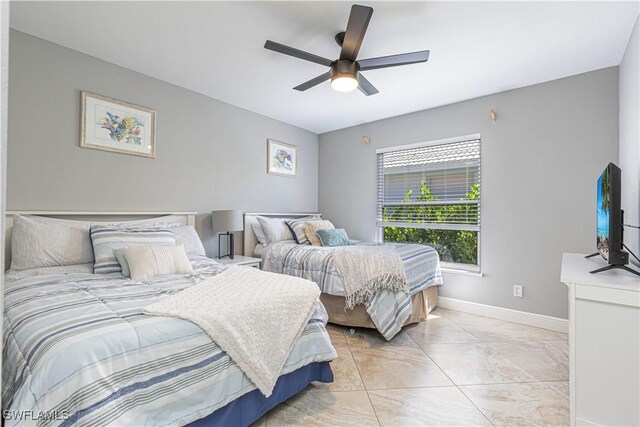 1633 Barbarosa Ct, Marco Island, FL 34145 - bedroom with baseboards, ceiling fan, and marble finish floor
