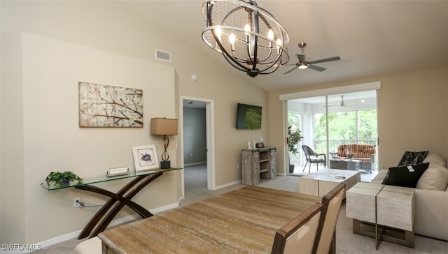 6645 Huntington Lakes Cir Unit 201, Naples, FL 34119 - dining space with ceiling fan with notable chandelier, visible vents, baseboards, and light colored carpet