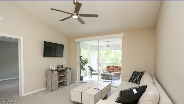 6645 Huntington Lakes Cir Unit 201, Naples, FL 34119 - living area with light colored carpet, lofted ceiling, a ceiling fan, and baseboards