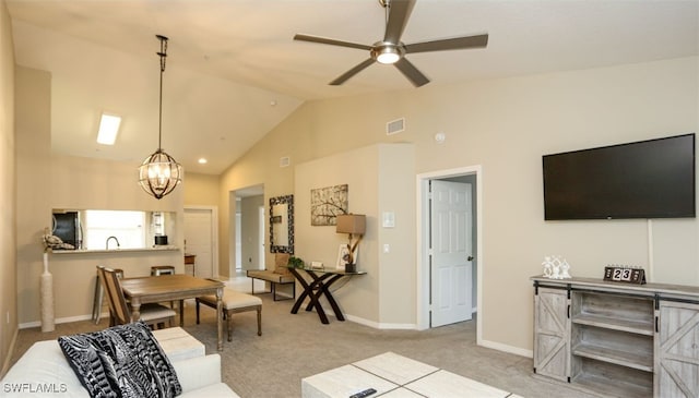 6645 Huntington Lakes Cir Unit 201, Naples, FL 34119 - living room with baseboards, visible vents, carpet, lofted ceiling, and ceiling fan with notable chandelier