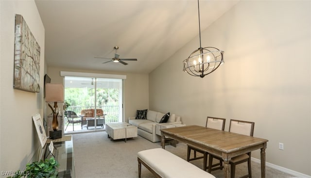6645 Huntington Lakes Cir Unit 201, Naples, FL 34119 - living area with ceiling fan with notable chandelier, carpet flooring, and high vaulted ceiling