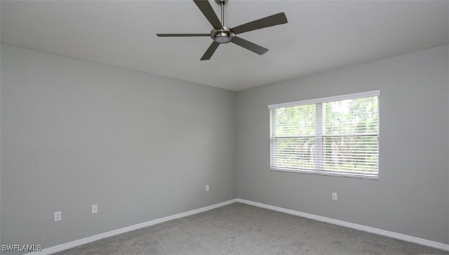 6645 Huntington Lakes Cir Unit 201, Naples, FL 34119 - carpeted spare room featuring a ceiling fan and baseboards
