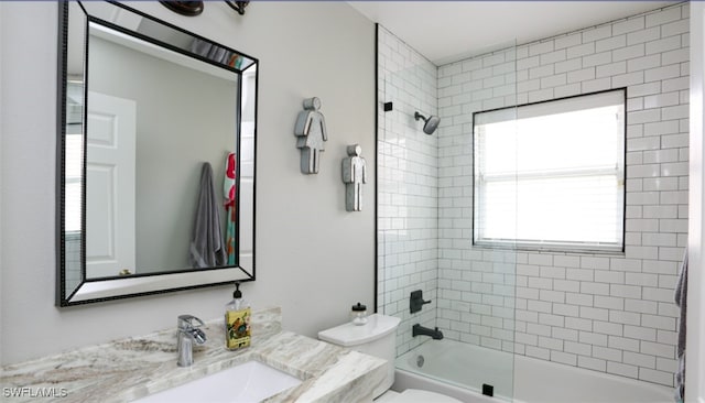 6645 Huntington Lakes Cir Unit 201, Naples, FL 34119 - bathroom with shower / bathtub combination, toilet, and vanity