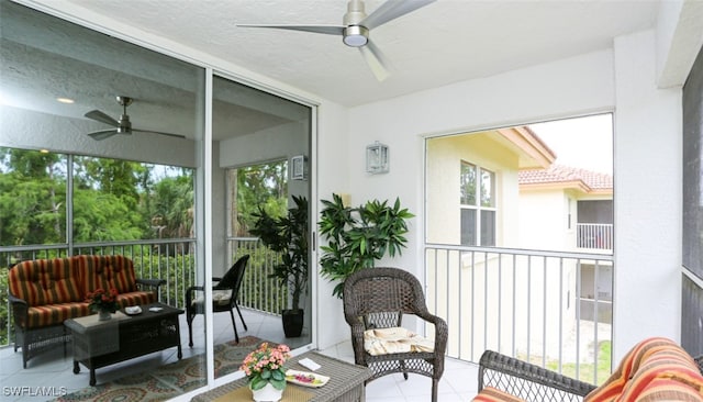 6645 Huntington Lakes Cir Unit 201, Naples, FL 34119 - sunroom with a ceiling fan and an outdoor hangout area