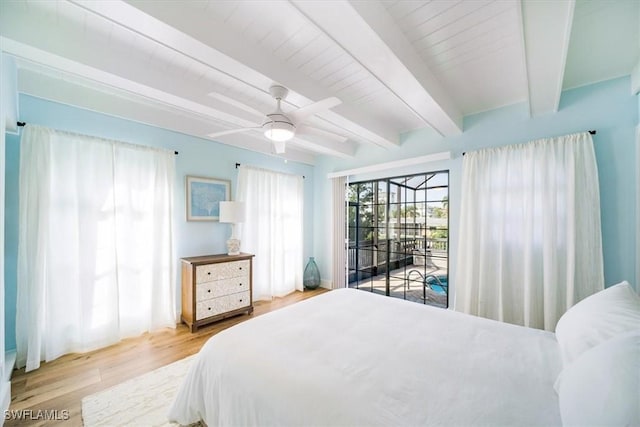 bedroom featuring wood finished floors, beamed ceiling, and a ceiling fan