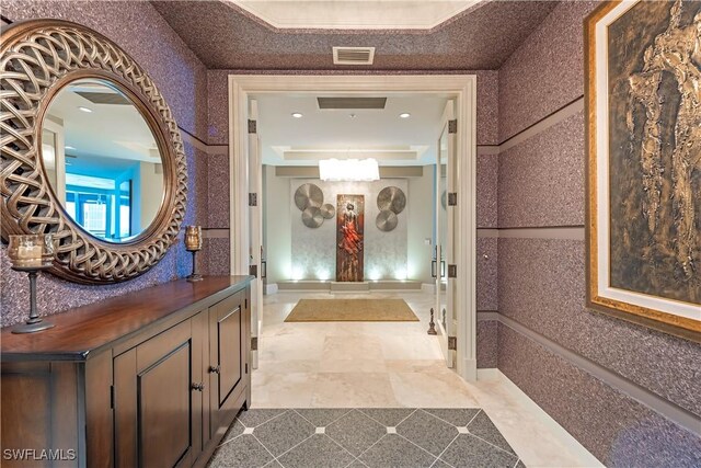 81 Seagate Dr Unit 1101, Naples, FL 34103 - corridor with recessed lighting and tile patterned flooring
