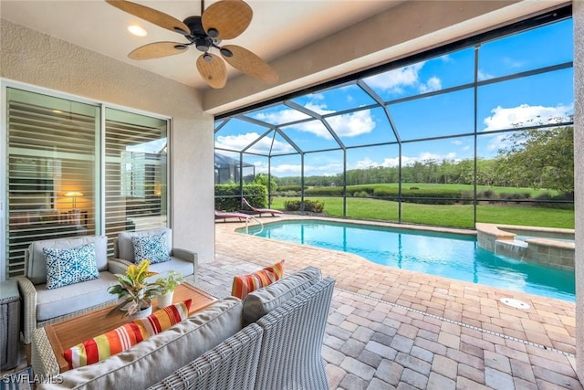 9102 Limestone Ln, Naples, FL 34120 - view of swimming pool featuring a patio, outdoor lounge area, glass enclosure, and a ceiling fan