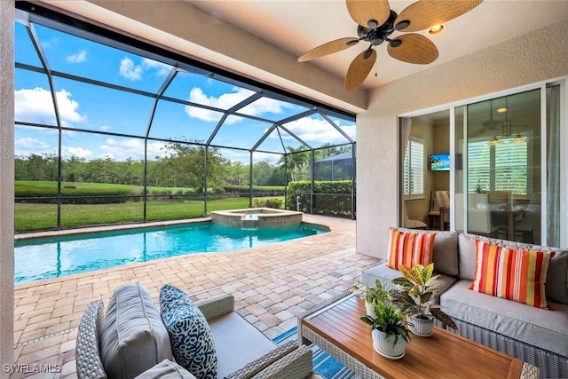 9102 Limestone Ln, Naples, FL 34120 - view of swimming pool with ceiling fan, a pool with connected hot tub, outdoor lounge area, a patio, and a lanai