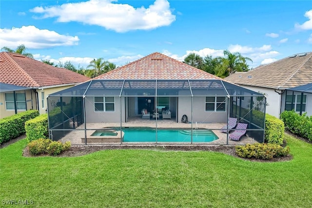 9102 Limestone Ln, Naples, FL 34120 - rear view of house with a yard, a lanai, a patio, and stucco siding
