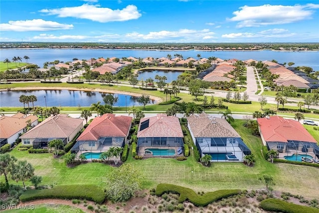 9102 Limestone Ln, Naples, FL 34120 - drone / aerial view with a water view and a residential view