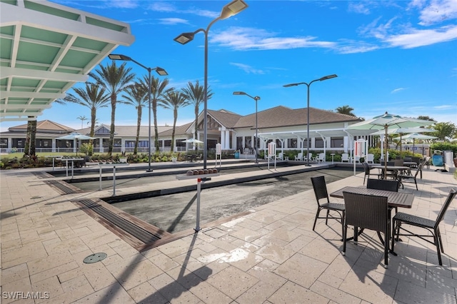 9102 Limestone Ln, Naples, FL 34120 - surrounding community with a residential view