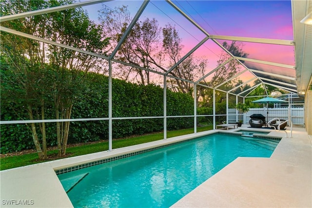 167 Burnt Pine Dr, Naples, FL 34119 - view of swimming pool with a pool with connected hot tub, a lanai, a fenced backyard, and a patio