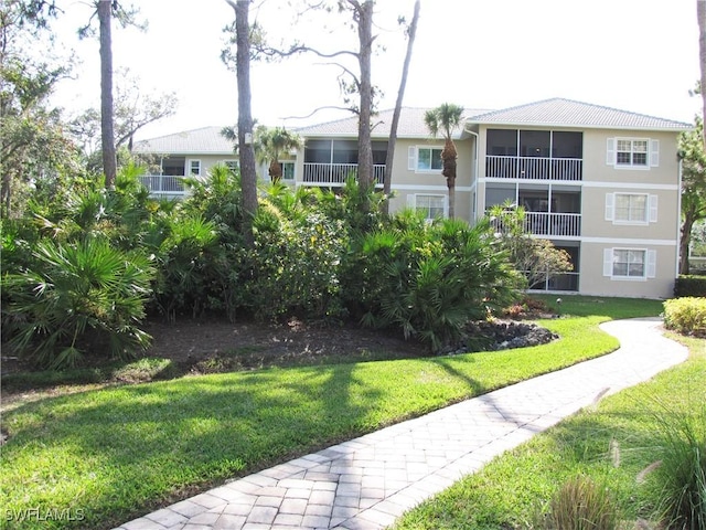 surrounding community with a lawn