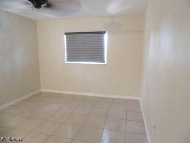 18215 Iris Rd, Fort Myers, FL 33967 - spare room featuring light tile patterned floors and ceiling fan