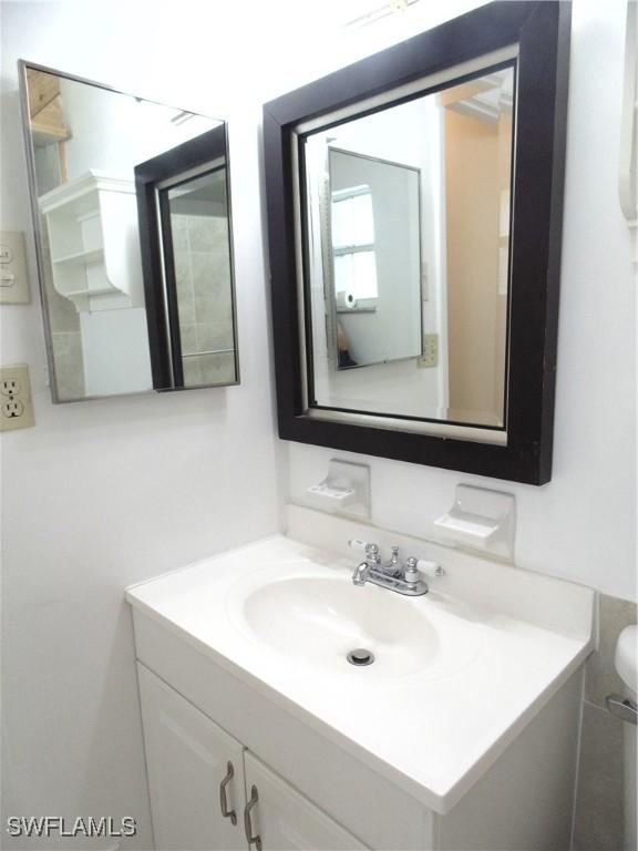18215 Iris Rd, Fort Myers, FL 33967 - half bath featuring vanity