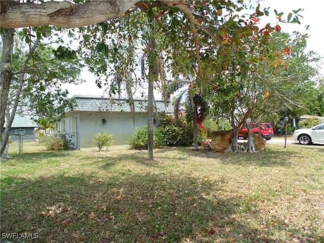 18215 Iris Rd, Fort Myers, FL 33967 - view of yard featuring fence