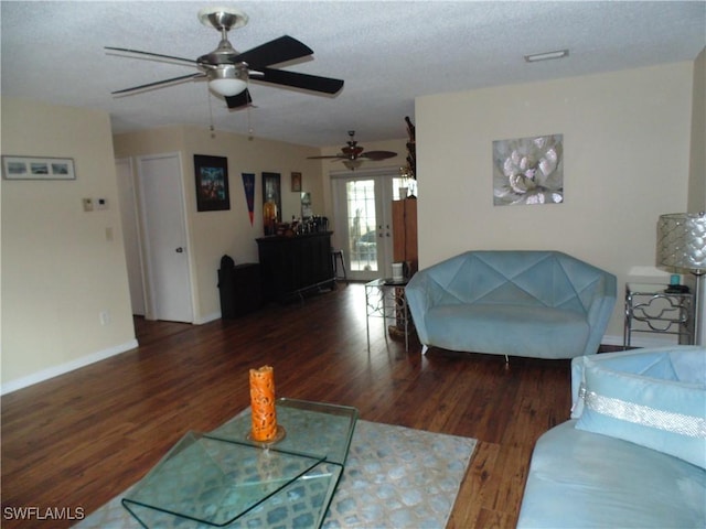 18215 Iris Rd, Fort Myers, FL 33967 - living room with ceiling fan, a textured ceiling, wood finished floors, and baseboards
