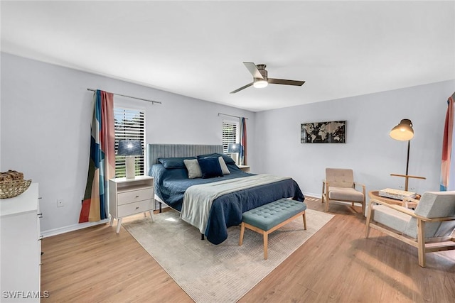 171 Palmetto Dunes Cir, Naples, FL 34113 - bedroom featuring light wood-style floors, baseboards, and a ceiling fan