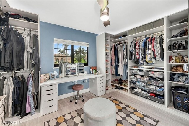 171 Palmetto Dunes Cir, Naples, FL 34113 - spacious closet featuring wood finished floors