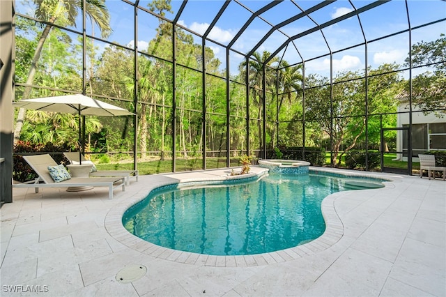view of swimming pool with a lanai, a patio, and a pool with connected hot tub