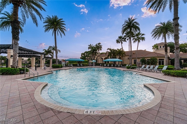 community pool featuring a patio area
