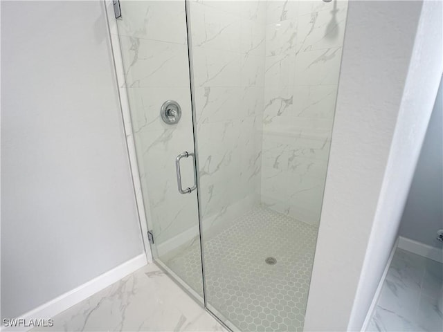 1103 Tropicana Pkwy W, Cape Coral, FL 33993 - full bath featuring a shower stall, marble finish floor, and baseboards
