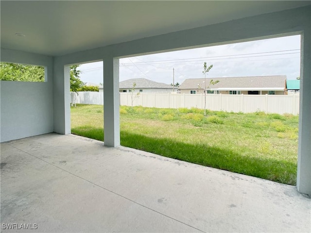 1103 Tropicana Pkwy W, Cape Coral, FL 33993 - view of patio featuring fence