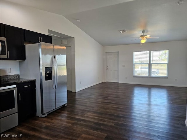 7027 Palpano Cir, Labelle, FL 33935 - kitchen featuring lofted ceiling, dark cabinetry, dark wood finished floors, appliances with stainless steel finishes, and ceiling fan