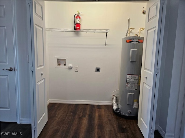 7027 Palpano Cir, Labelle, FL 33935 - clothes washing area with washer hookup, laundry area, hookup for an electric dryer, wood finished floors, and water heater
