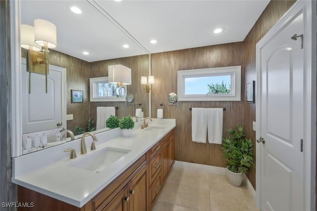 152 Conners Ave, Naples, FL 34108 - full bathroom with recessed lighting, double vanity, and a sink