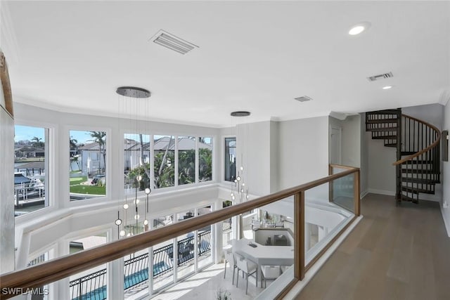 152 Conners Ave, Naples, FL 34108 - hallway featuring crown molding and visible vents