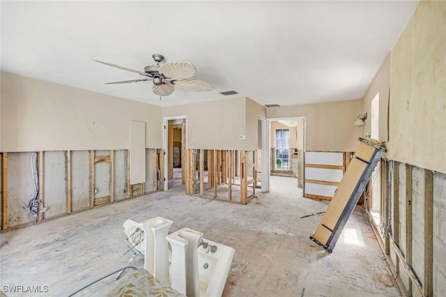 unfurnished room featuring a ceiling fan and visible vents