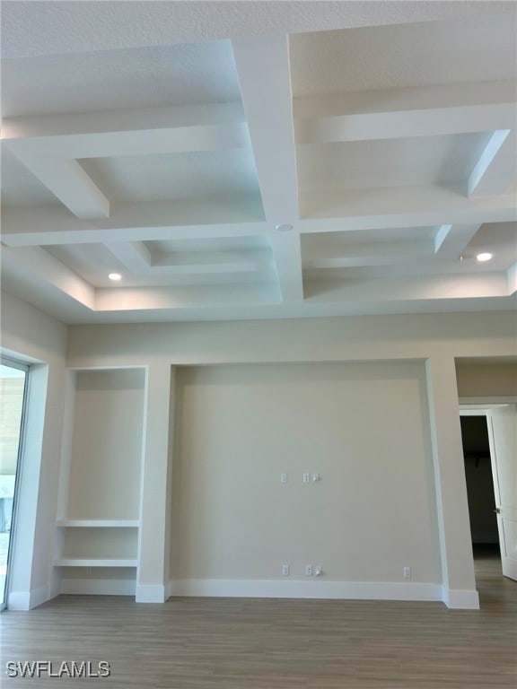 9499 Caymas Way, Naples, FL 34114 - unfurnished room with coffered ceiling, wood finished floors, beamed ceiling, and recessed lighting