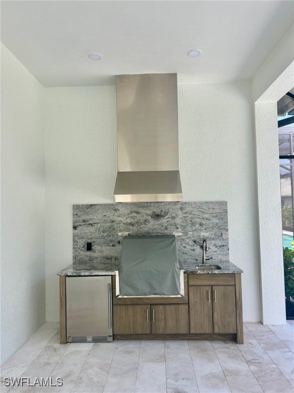 9499 Caymas Way, Naples, FL 34114 - view of patio with a sink and area for grilling
