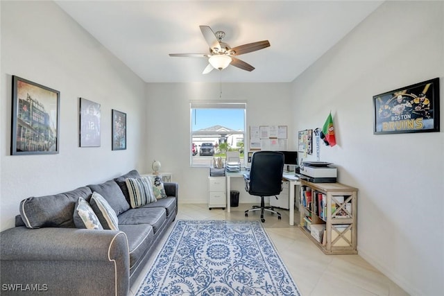 office with baseboards, light tile patterned flooring, and ceiling fan