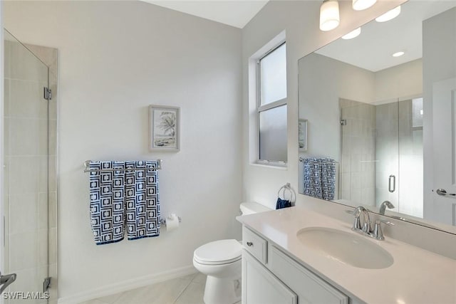 full bathroom with toilet, tile patterned floors, a stall shower, and vanity