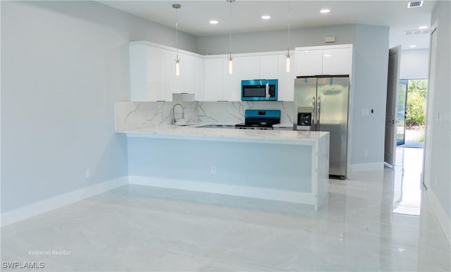 kitchen featuring modern cabinets, a peninsula, white cabinetry, appliances with stainless steel finishes, and decorative backsplash